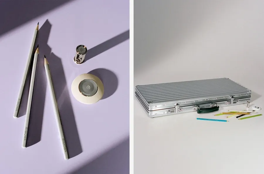 Stifte und Zeichenwerkzeug auf fliederfarbenem Grund, daneben der geschlossene Artist Case von RIMOWA × Faber-Castell